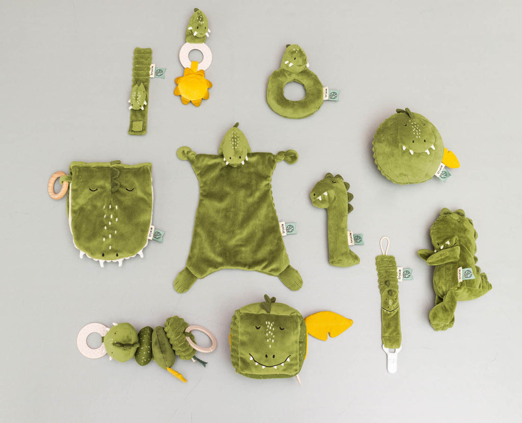 Jouet dinosaure vert en peluche pour landau avec ficelle à tirer, fonction dansante et anneau de dentition
