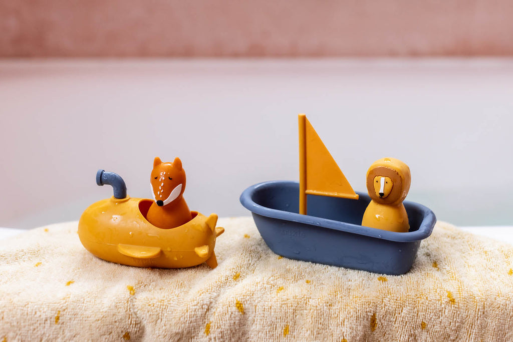 Jouet de bain sous-marin en silicone jaune au design doux, arrondi et ludique