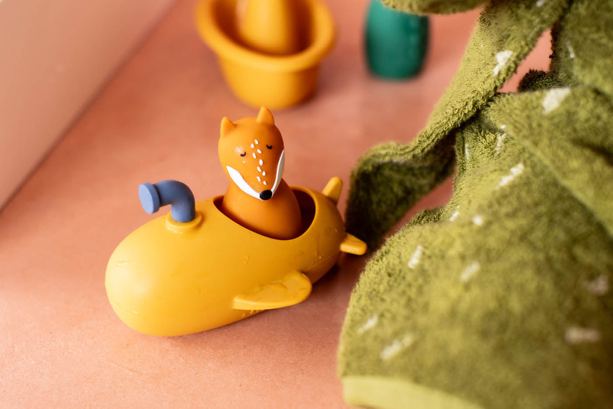 Jouet de bain sous-marin en silicone jaune au design doux, arrondi et ludique