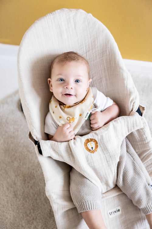 Housse en coton beige pour baby-bouncer avec détail de lion brodé